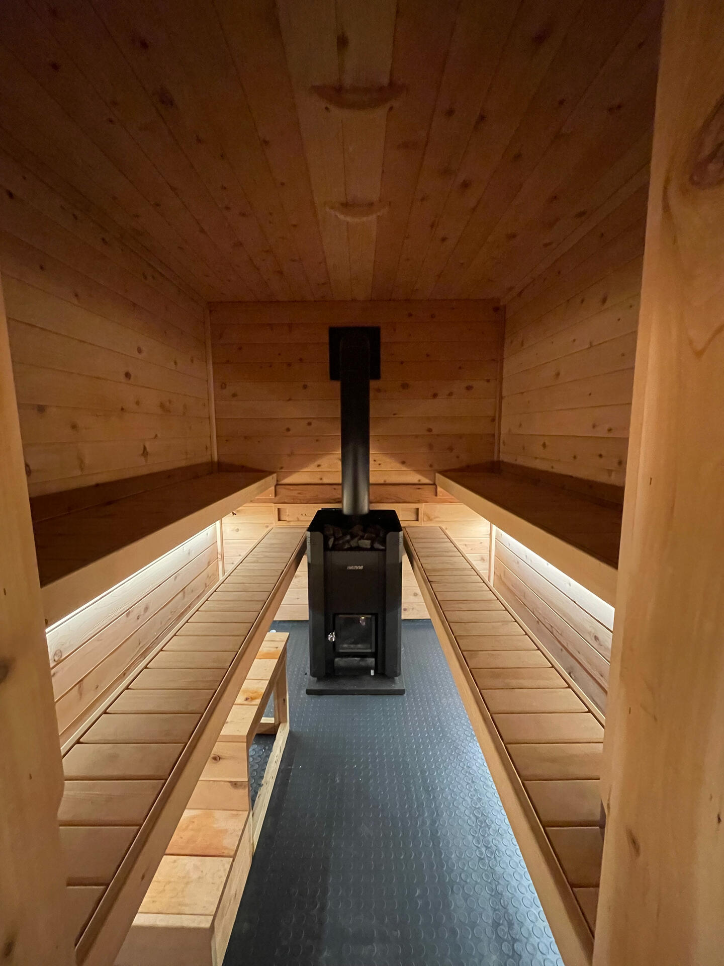 Father and Son enjoy a wood-fired, Finnish steam sauna. Sauna in Prescott, AZ